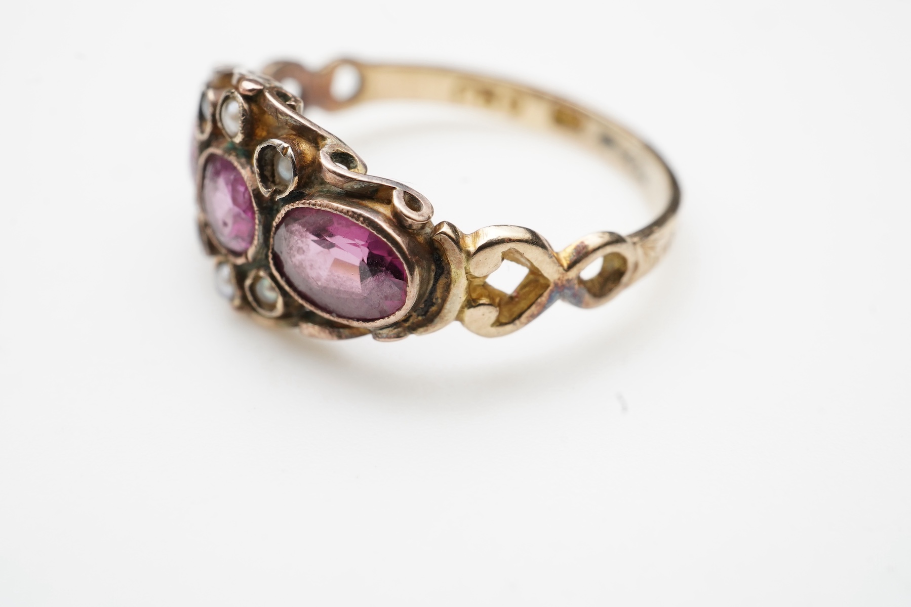 A Victorian garnet and seed pearl ring, mid 19th century